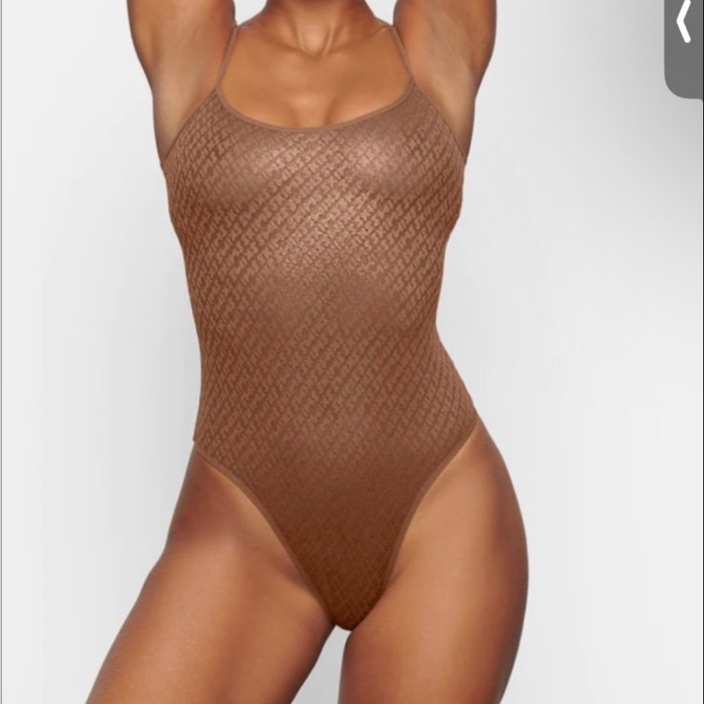 Skims Foil Logo Thong Bodysuit. Brand new with tags. Size XL.